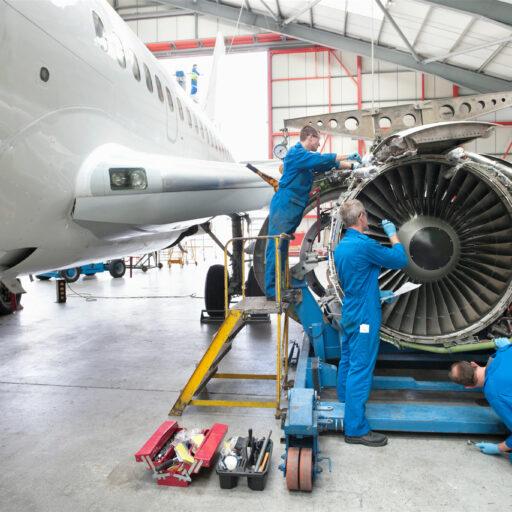 Engineers fixing turbofan